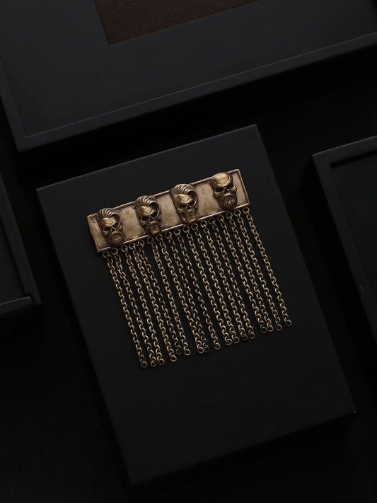 The Skull-Age Brooch