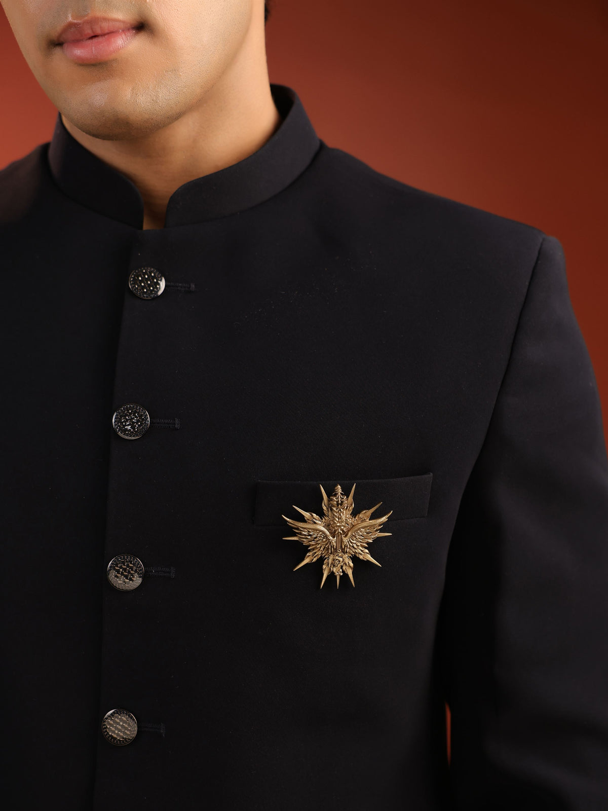 The Celestial Winged Crest brooch - antique gold brooch for men with celestial winged crest motif, worn on outfit