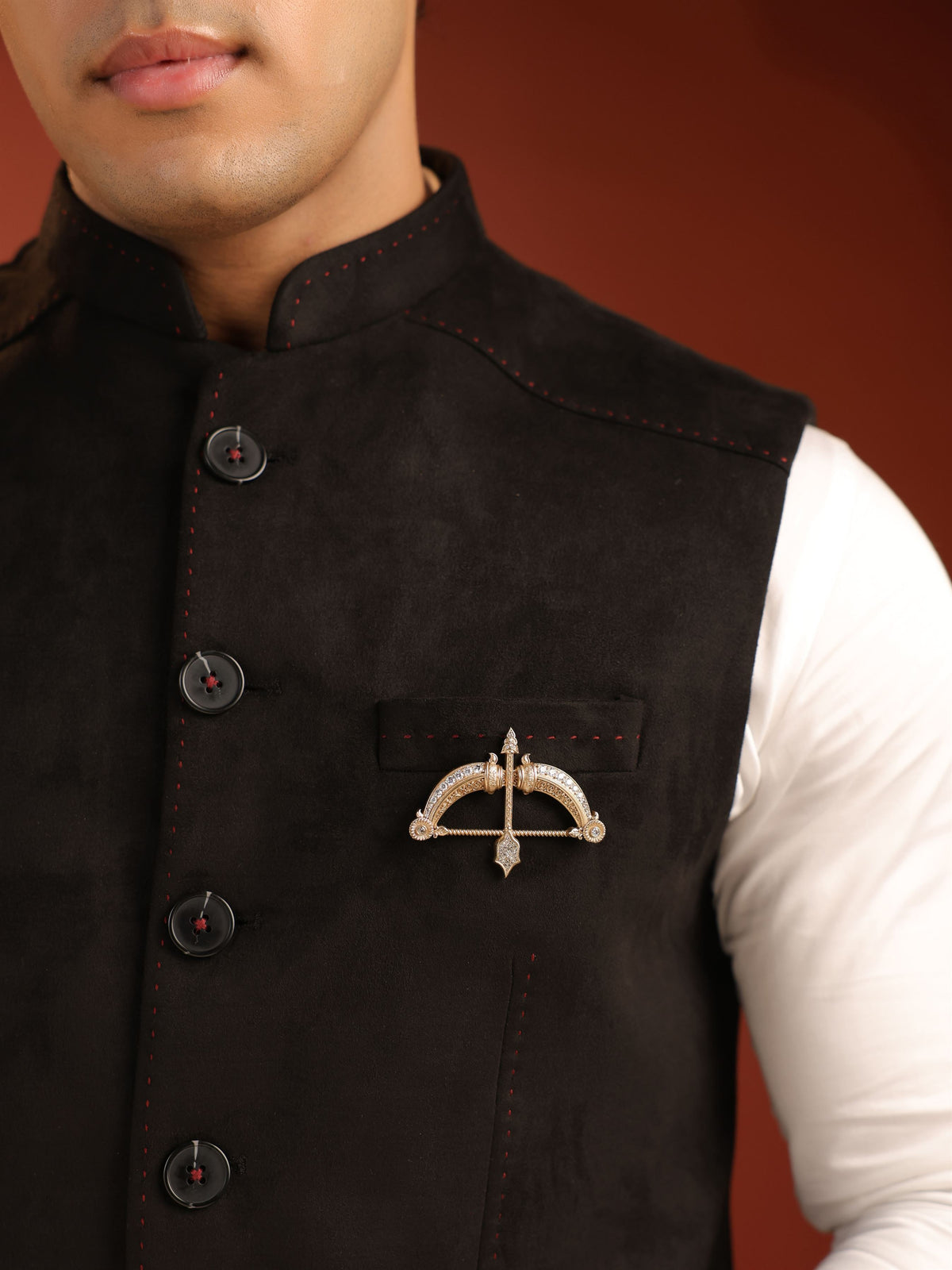 The Royal Dhanush brooch - antique gold brooch for men with royal dhanush motif, angled view
