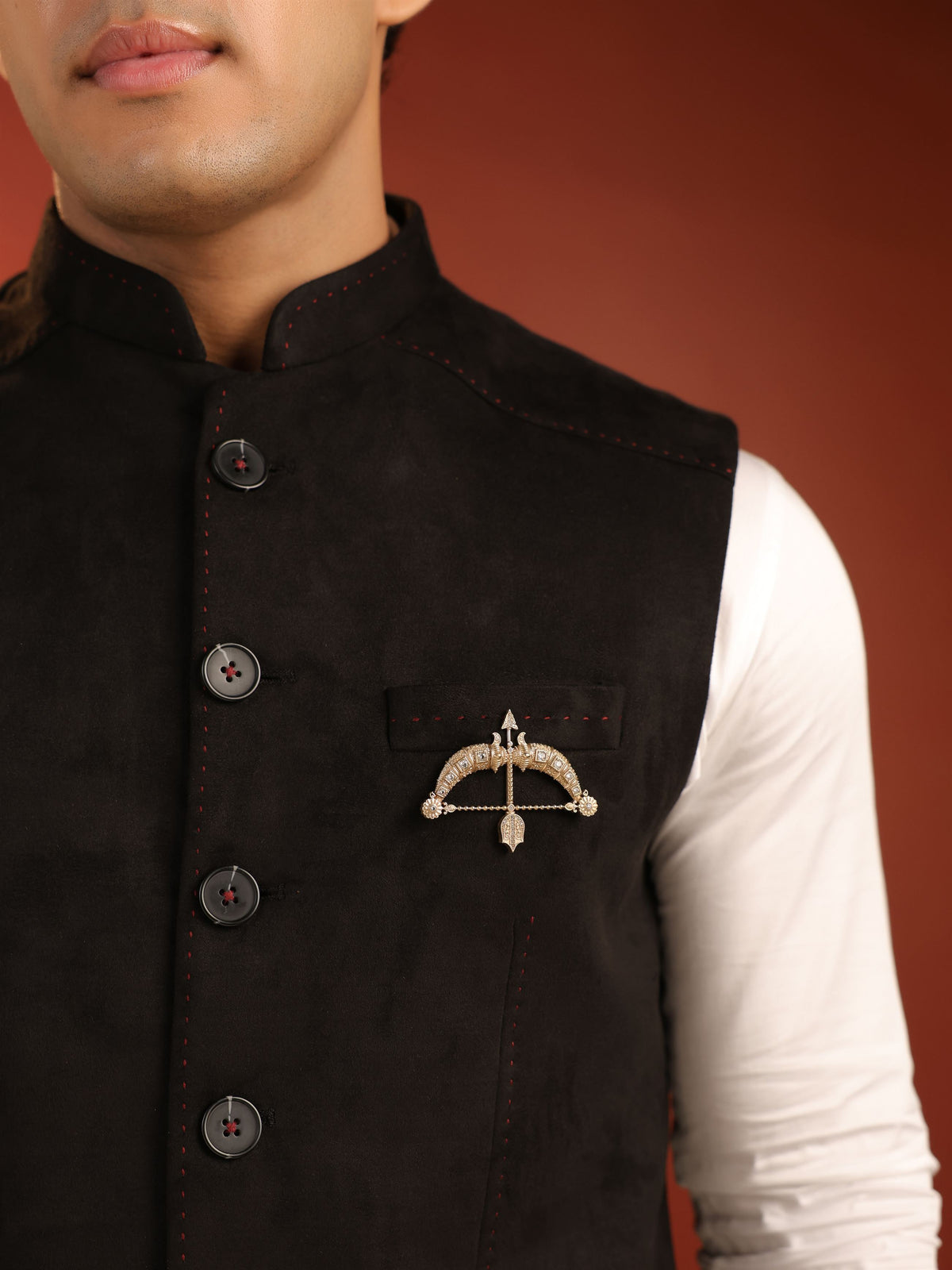 The Crystal Heritage Dhanush brooch - antique gold brooch for men with crystal heritage dhanush motif, angled view