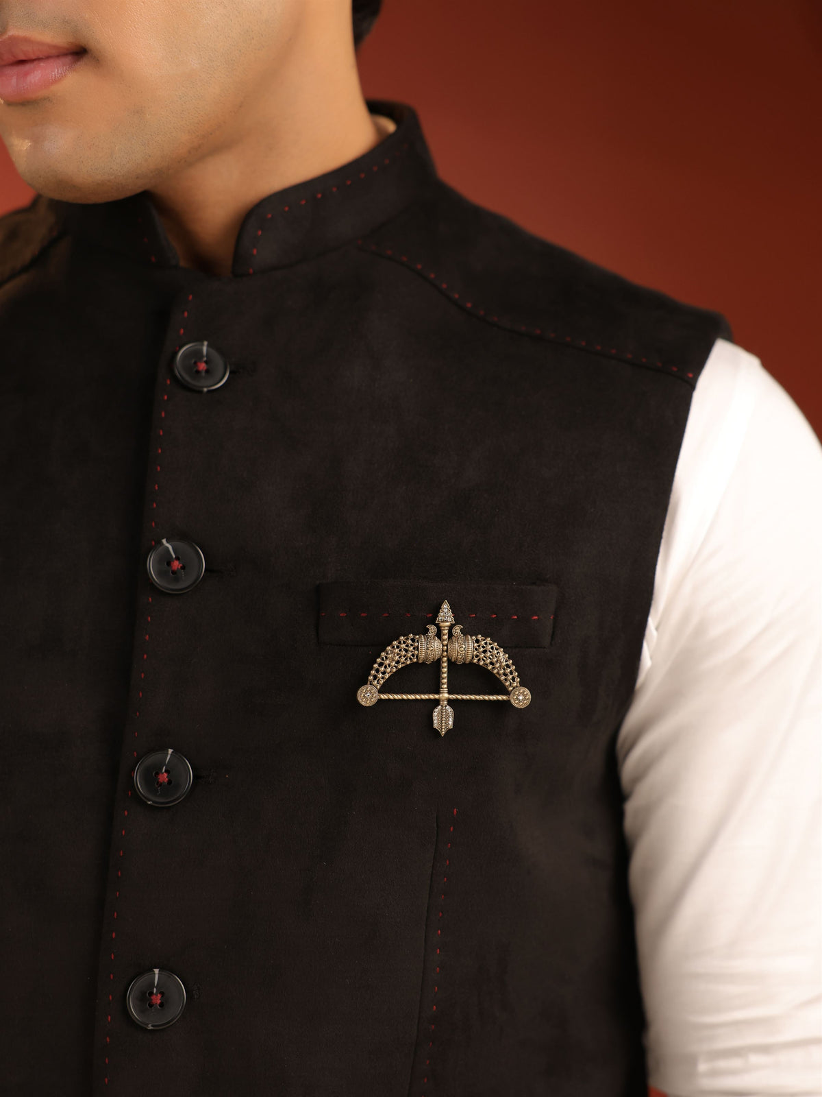 The Beaded Heritage Dhanush brooch - antique gold brooch for men with beaded heritage dhanush motif, angled view
