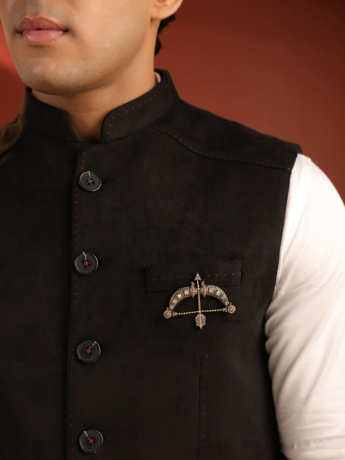 The Crystal Maharaja Dhanush brooch - antique gold brooch for men with crystal maharaja dhanush motif, angled view