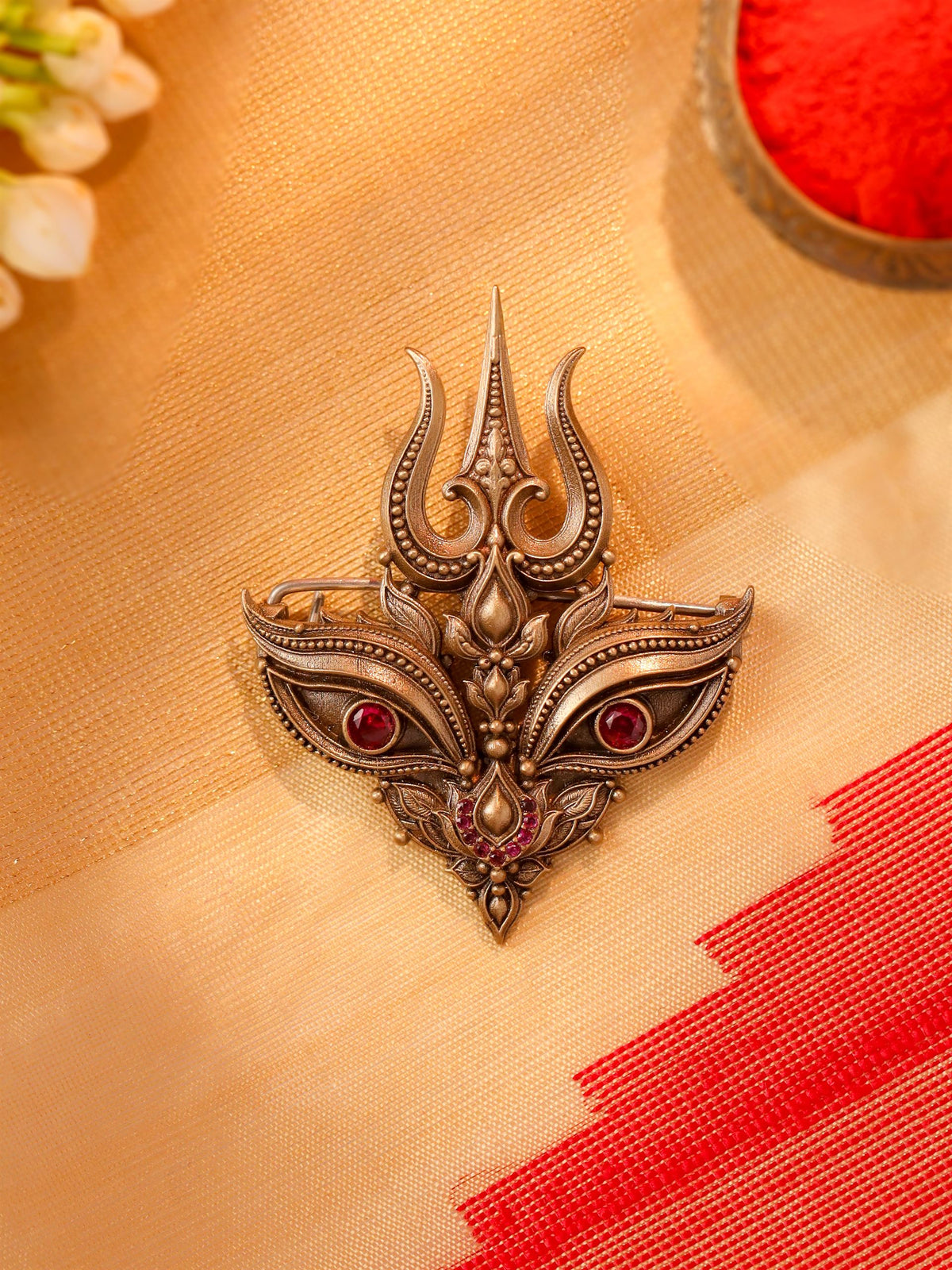 Raudramukhi Brooch