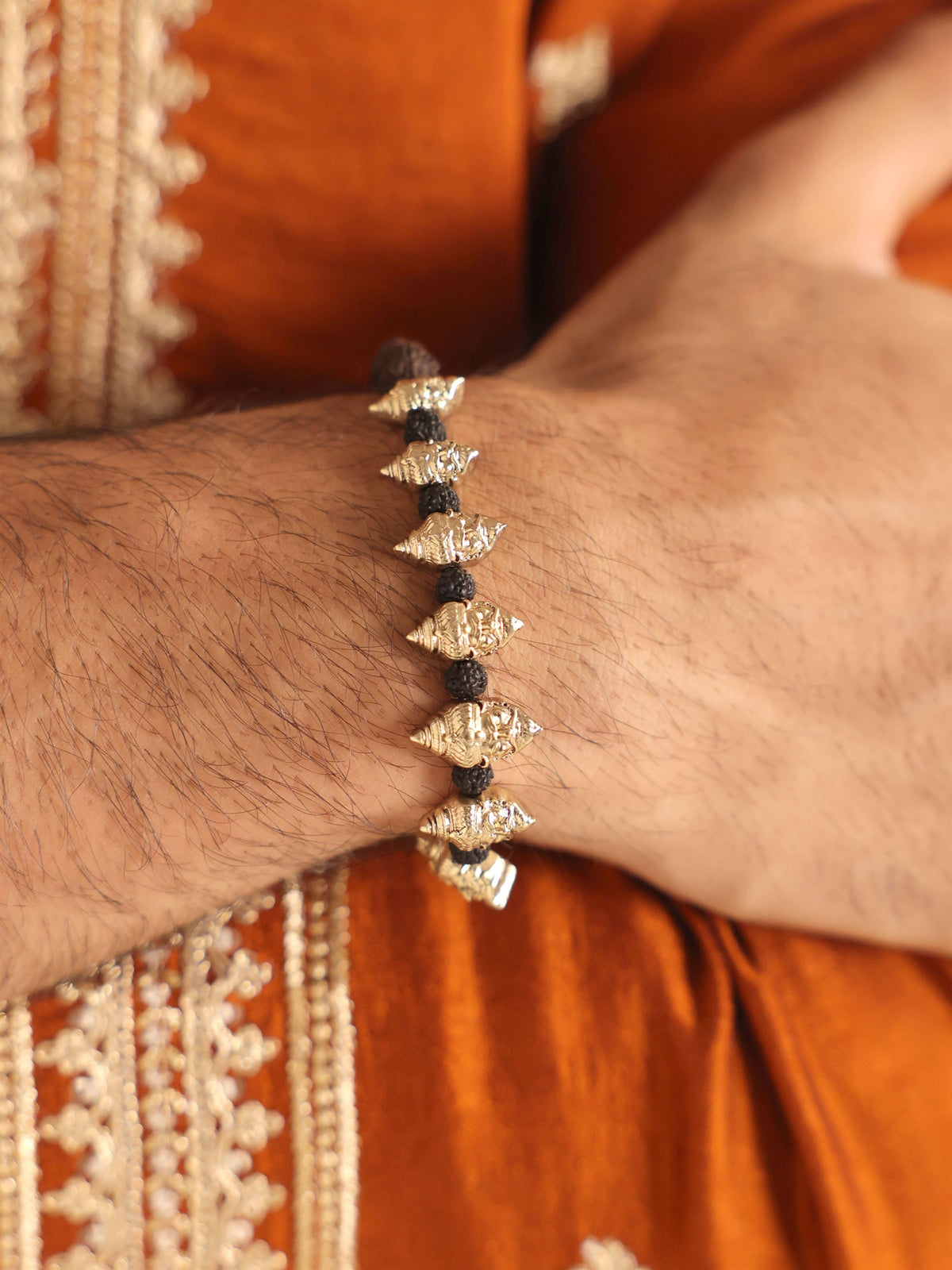 Lankesh Veer bracelet - antique gold bracelet for men with lankesh veer motif, on model