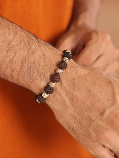 Rudra Sutra bracelet - antique gold bracelet for men with rudra sutra motif, close-up view