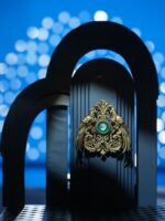 Emerald Stallion Crest Brooch